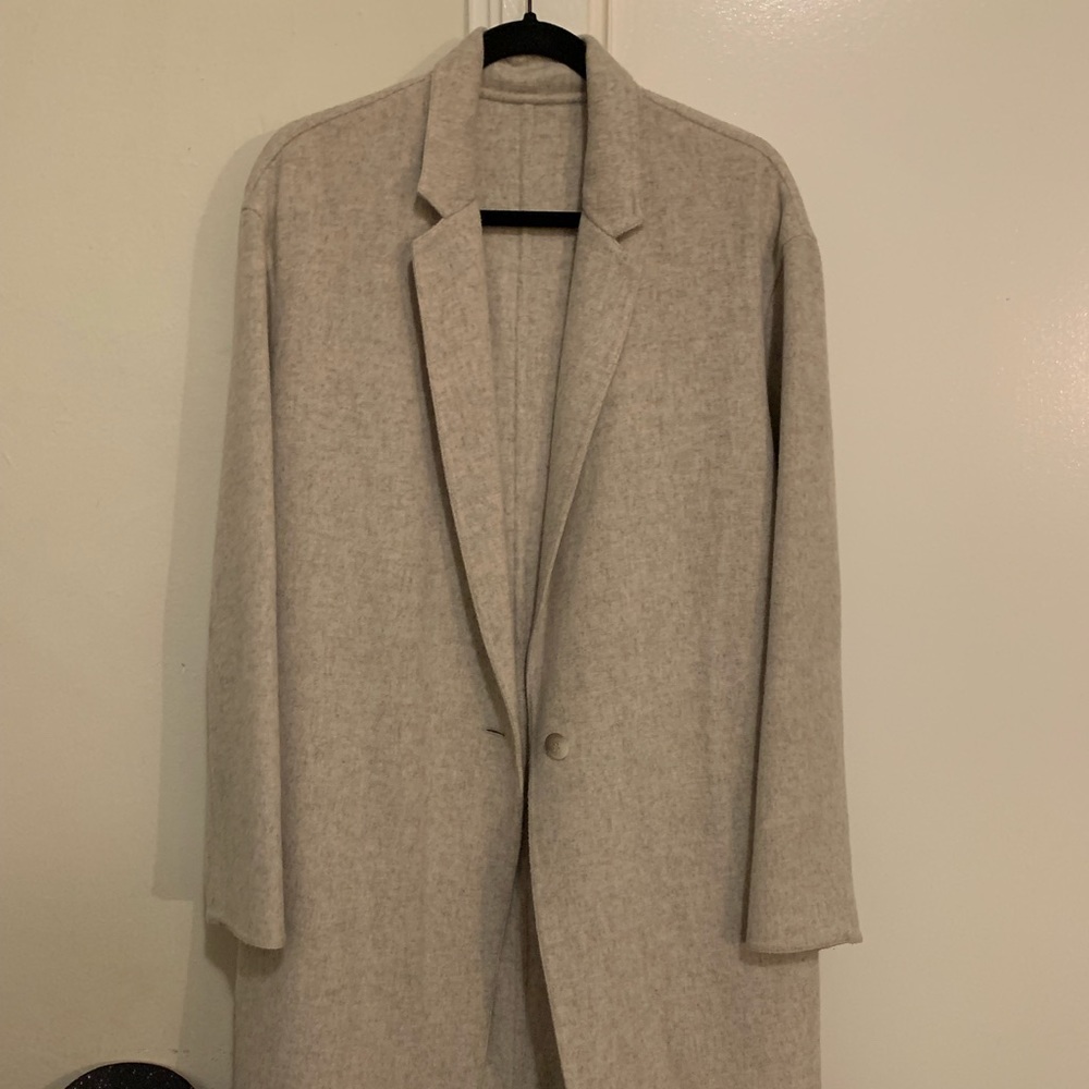Wool coat, knee length single button with pockets